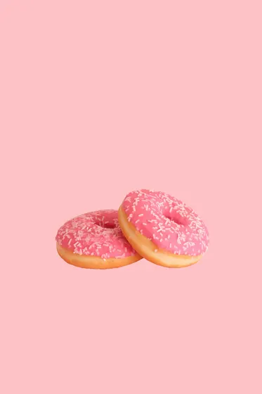 Two pink iced doughnuts